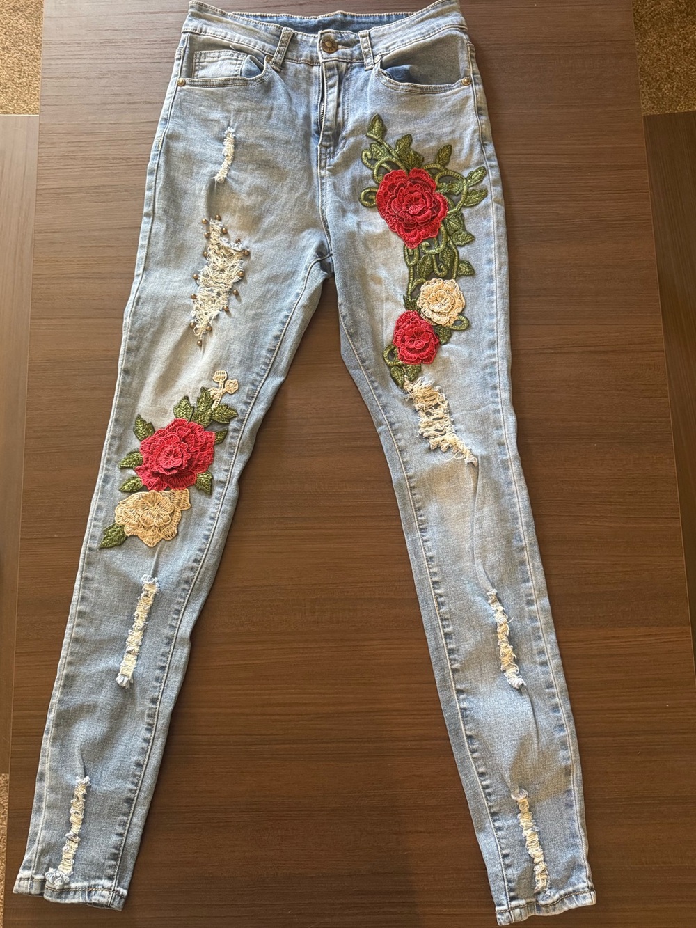 Light Wash Skinny Jeans with Red Floral Appliqué